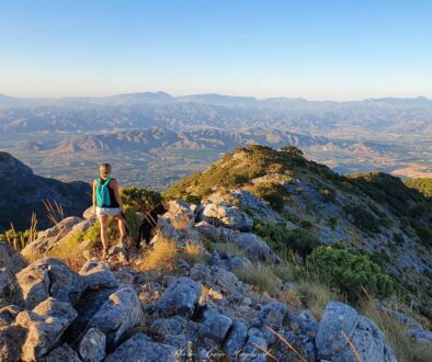 A girl standing on top of a Mijas mountain